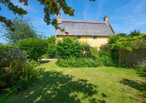 1 New Thatched Cottage - Housity