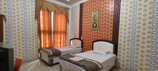 OYO 93123 Wisma Hamalau Syariah - Housity