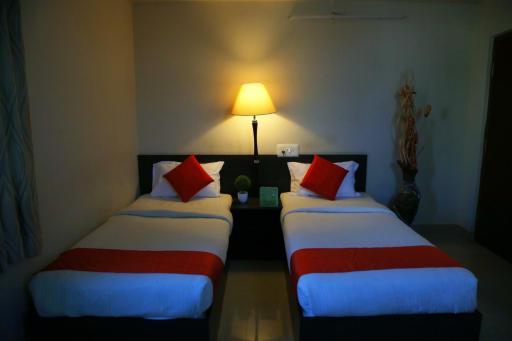 Orange Corner Hotel, Airport pickup & drop Available 24X7 - Housity