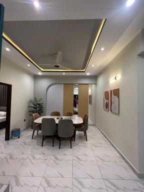 Travellers Heaven 3BR APT DHA PHASE VI Nishat Commercial - Housity