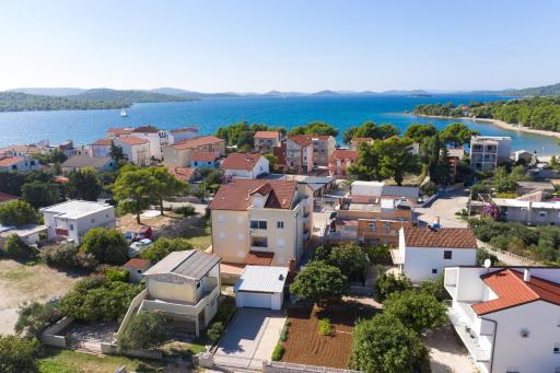 Apartments by the sea Pirovac, Sibenik - 15659 - Housity