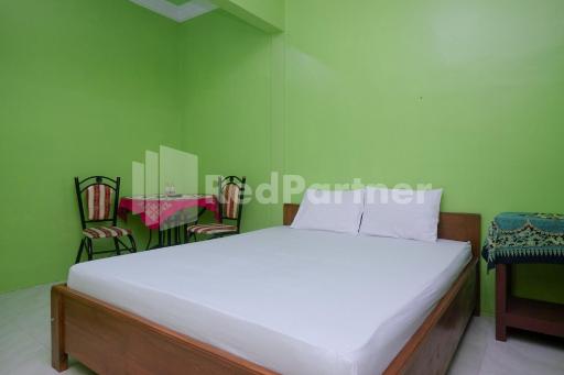 Wisma Giri Mulyo B near Grojogan Sewu Mitra RedDoorz - Housity