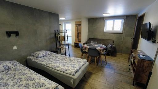 Przystanek Tykocin - apartamenty gościnne - Housity