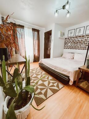 Black & Bold - 1BR Condo 50mbpsWIFI near SM Marilao - Housity