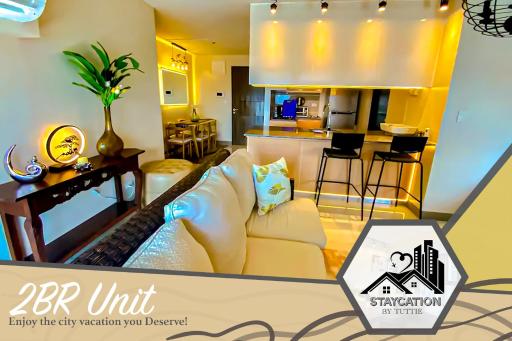 Luxurious 2 Bedroom Family Suite plus Maid Rm in Eastwood City - Housity