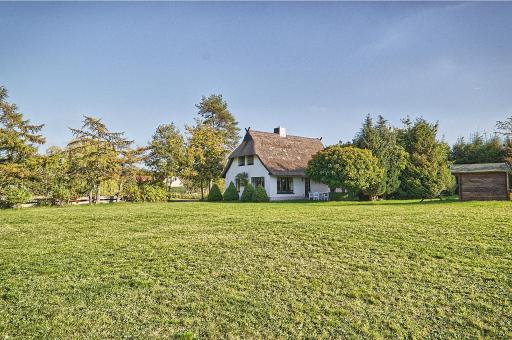 Reetdachhaus mit großem Garten und Kamin - Housity