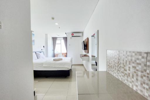 RedLiving Apartemen Enviro - Aurora Rooms - Housity