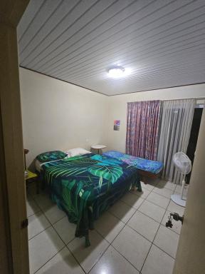 Private Room in our Home Stay by Kohutahia Lodge, 7 min by car to airport and town - Housity