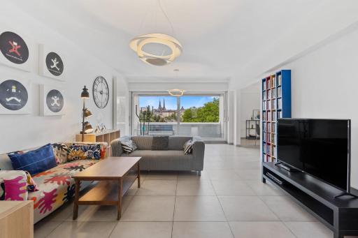 Central Lux 2BR Apt with City Views & Balcony - Housity
