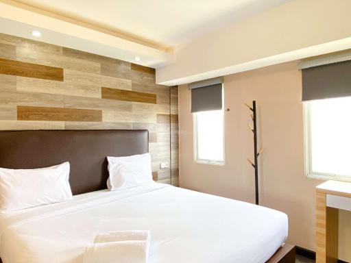 Best Deal and Homey 1BR Apartment Grand Sentraland Karawang By Travelio - Housity