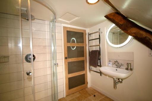 Putsborough Manor 3 Self Catering Cottages with Beach a short walk dog friendly all year, On site Tennis, Play Area, Paddock, Spa baths, BBQ, Private Gardens, Superfast WIFI - Housity