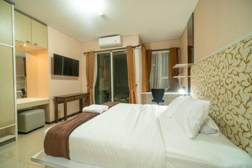 2BR at central city view Thamrin residence Netflix - Housity