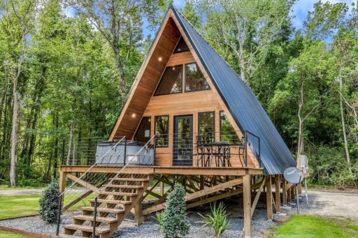 Modern A-Frame Cabin by Rip Van Winkle with Hot Tub - Housity