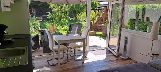 All-in-One Apartment mit eigener Sonnenterrasse im Garten - Housity