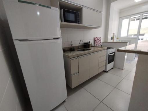 Apartamento na praia da Guilhermina com garagem - Housity