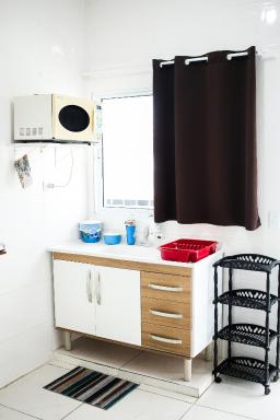 Loft01 com garagem, Wi-fi, 25 min de Aparecida - Housity