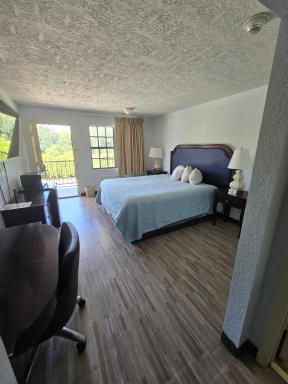 Best Price Motel & Suites - Housity