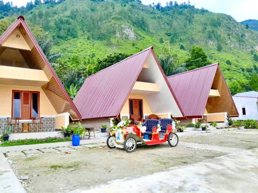 UNIQDO Inn Tomok - Housity
