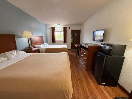 Relax Inn & Suites - Housity