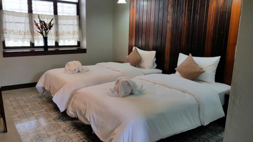 Thaimueang Boutique Hotel - Housity