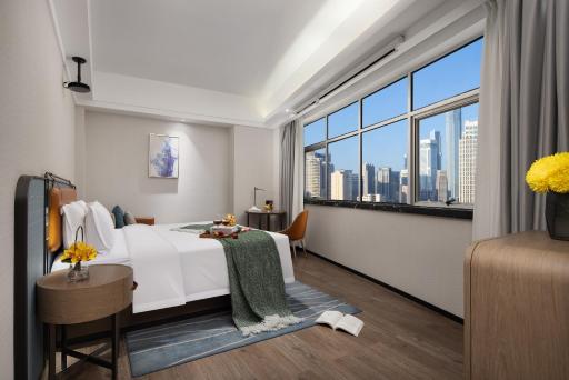 Anya Hotel -Next to Jiefang West Bar Street 2 minutes to the subway station free coffee free laundry free gym, huge windows - Housity