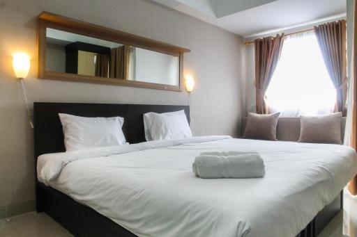 Minimalist Studio The Oasis Apartment near Omni Hospital Cikarang By Travelio - Housity