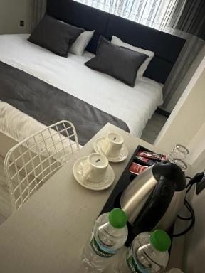 MET-İNN Suites Otel - Housity