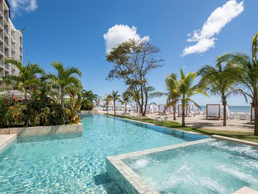 Playa Caracol Apt with Radisson Hotel Amenities - Housity