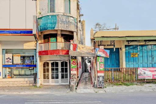 SPOT ON 93385 Penginapan Hj Lilis 2 Syariah - Housity