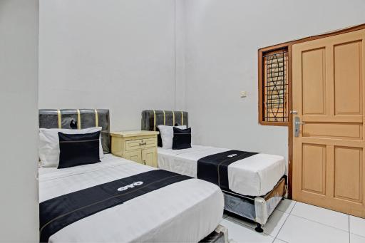 Capital O 93361 Dynasty Inn Syariah - Housity