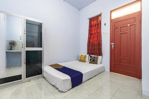 SPOT ON 93966 Dhiya Guest House Syariah - Housity
