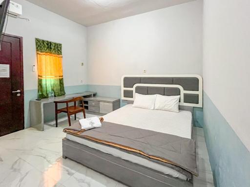 Kusuma Guest House Jombang RedPartner near Station Jombang - Housity