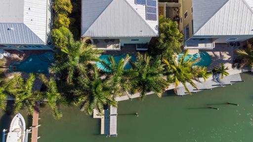 Luxury Waterfront Home With A Heated Pool And Spa! - Housity