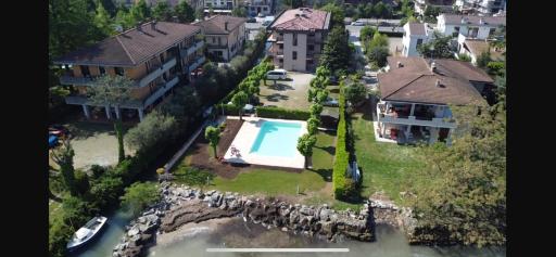 Casa Lugana 9 - monolocale con piscina fronte lago - Housity