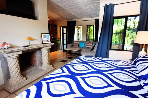 King Bed in Our Guest Room at Inn Ajijic - Housity