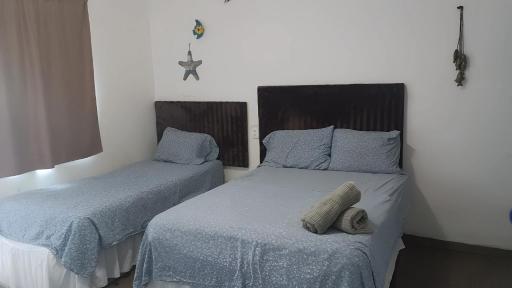 Habitaciones-cómodas-aire-wifi-tv-cerca de playa-!!excelente precio ii - Housity