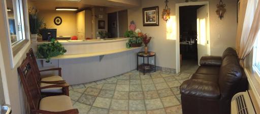 Hilltop Inn & Suites - Housity