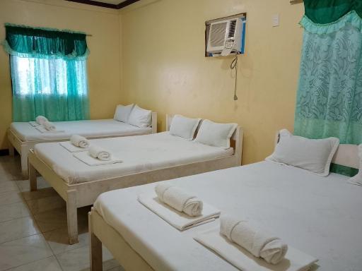 RedDoorz at July's Haven Seaside Pension Camiguin - Housity