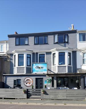 OYO Shore Surf Lodge - Housity