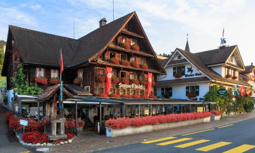 Beachfront · Private Beach Swiss-Chalet Merlischachen - Historik Chalet-Hotel Lodge - Housity