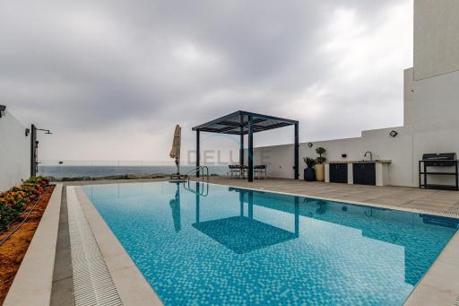 Stunning Sea Views from the Private Pool, Mins Away from Pristine Beaches and Key Fujairah Attractions, Sharm Al Dana Villa, Fujairah by Deluxe Holiday Homes - Housity