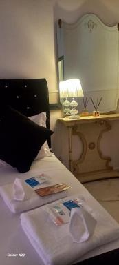 PALAZZO NOVECENTO Rooms - Housity