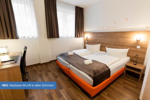 Orange Hotel und Apartments - Housity