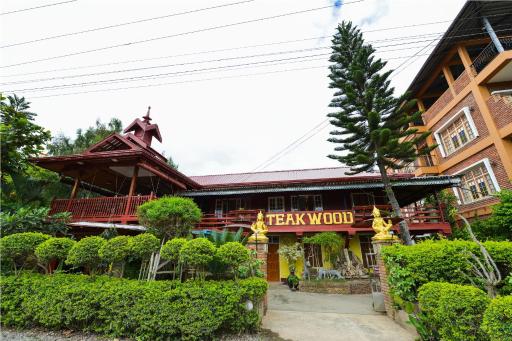 Teak Wood Hotel - Housity