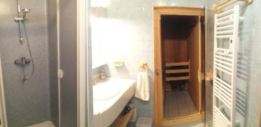 Appartement en résidence skis aux pieds avec sauna - Housity