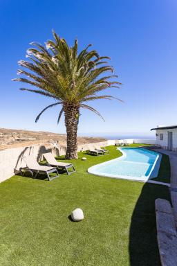 Oasis Tenerife Rentals con Piscina climatizada, Cocina exterior y Barbacoa - Housity