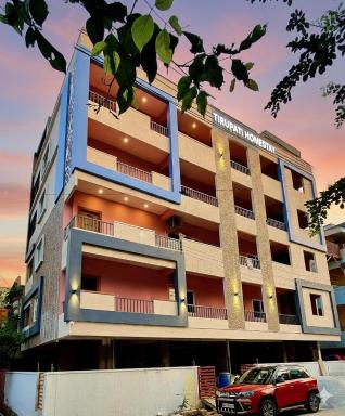 Tirupati Homestay - 2BHK AC Family Apartments near Alipiri and Kapilatheertham - Walk to A2B Veg Restaurant - Super fast WiFi - Android TV - 250 Jio Channels - Easy access to Tirumala - Housity