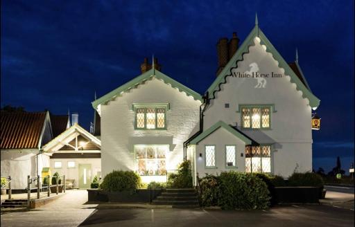 The White Horse Hotel and Luxury Shepherds Huts - Housity
