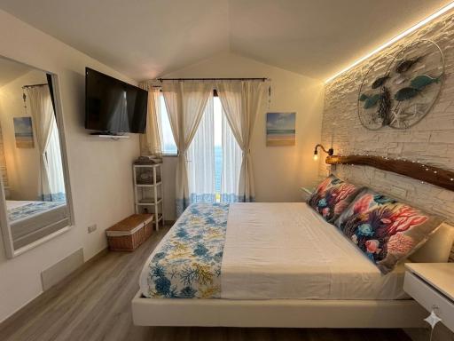 Oasi del Relax - Seaside Peaceful Panoramic Terrace in ITALY - new Sardinia apartment 50 mt beach&sea full comfort air conditioning-WiFi-Parking-Privacy - Housity