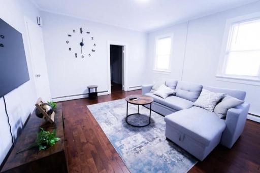 Cozy 1BR Apt with Workspace Near Train Station & Downtown - Housity